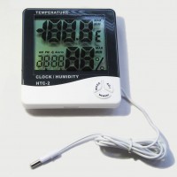 Thermometer with a sensor, hygrometer, clock, alarm clock